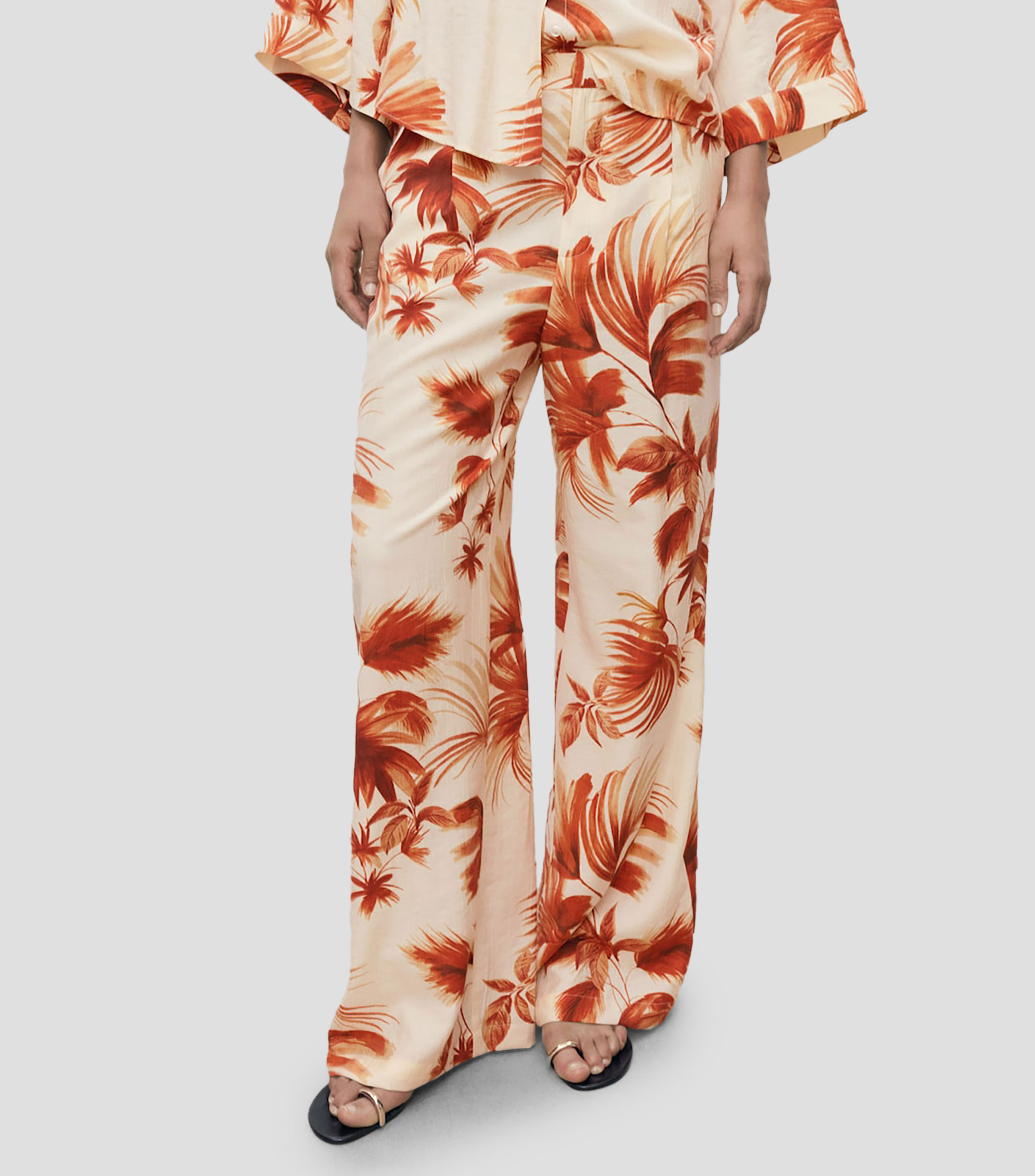 Pantalón con palmeras Mujer